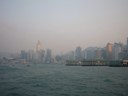 Victoria Harbour and the skyline of Hong Kong with the Central Plaza building, the Hong Kong Convention and Exhibition Centre and the Central Ferry Piers, viewed from the Star Ferry from Kowloon to Hong Kong Island