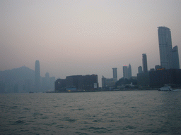 Victoria Harbour and the skyline of Hong Kong with the Two International Finance Centre and Victoria Peak, viewed from the Star Ferry from Hong Kong Island to Kowloon, at sunset