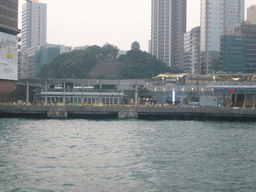 Victoria Harbour and the skyline of Kowloon with the Signal Hill Garden, viewed from the Star Ferry from Hong Kong Island to Kowloon, at sunset