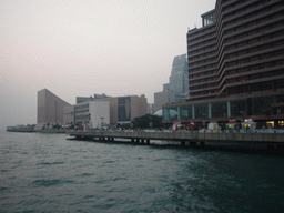 Victoria Harbour and the skyline of Kowloon with the Hong Kong Museum of Art, viewed from the Star Ferry from Hong Kong Island to Kowloon, at sunset
