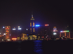 Victoria Harbour and the skyline of Hong Kong with the Hong Kong Convention and Exhibition Centre and the Central Plaza building, viewed from the Avenue of Stars, during the `A Symphony of Lights` light and sound show, by night