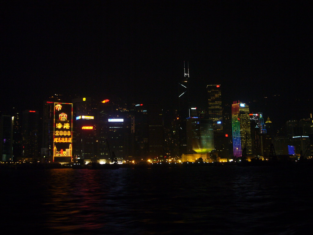 Victoria Harbour and the skyline of Hong Kong with the Bank of China Tower, viewed from the Star Ferry from Kowloon to Hong Kong Island, by night