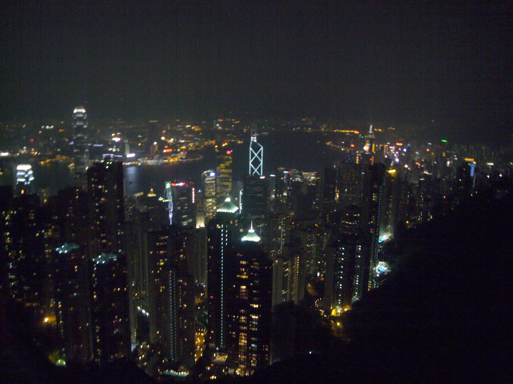 The skyline of Hong Kong and Kowloon with the Two International Finance Centre, the Bank of China Tower and the Central Plaza building, and Victoria Harbour, viewed from Victoria Peak, by night