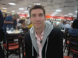 Tim at the restaurant at the Departure Hall of Doha International Airport