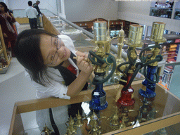 Miaomiao with waterpipes at the Departure Hall of Doha International Airport