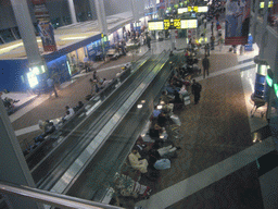 Stranded travellers at the Transit Hall of Dubai International Airport, viewed from the first floor