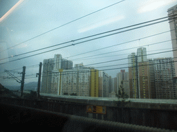Apartment buildings in the west of Hong Kong, viewed from the train from Hong Kong International Airport to Hong Kong Station