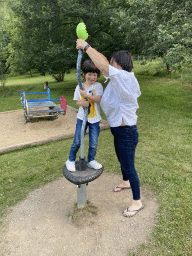 Miaomiao and Max at the playground at the petting zoo near the Vayamundo Houffalize hotel