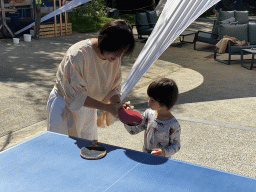 Miaomiao and Max playing table tennis at the back side of the Vayamundo Houffalize hotel