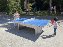 Miaomiao and Max playing table tennis at the back side of the Vayamundo Houffalize hotel