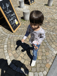 Max with an ice cream at the Place du Crucifix square