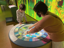 Miaomiao and Max playing a colour game at the sensory room of the Houtopia recreation center