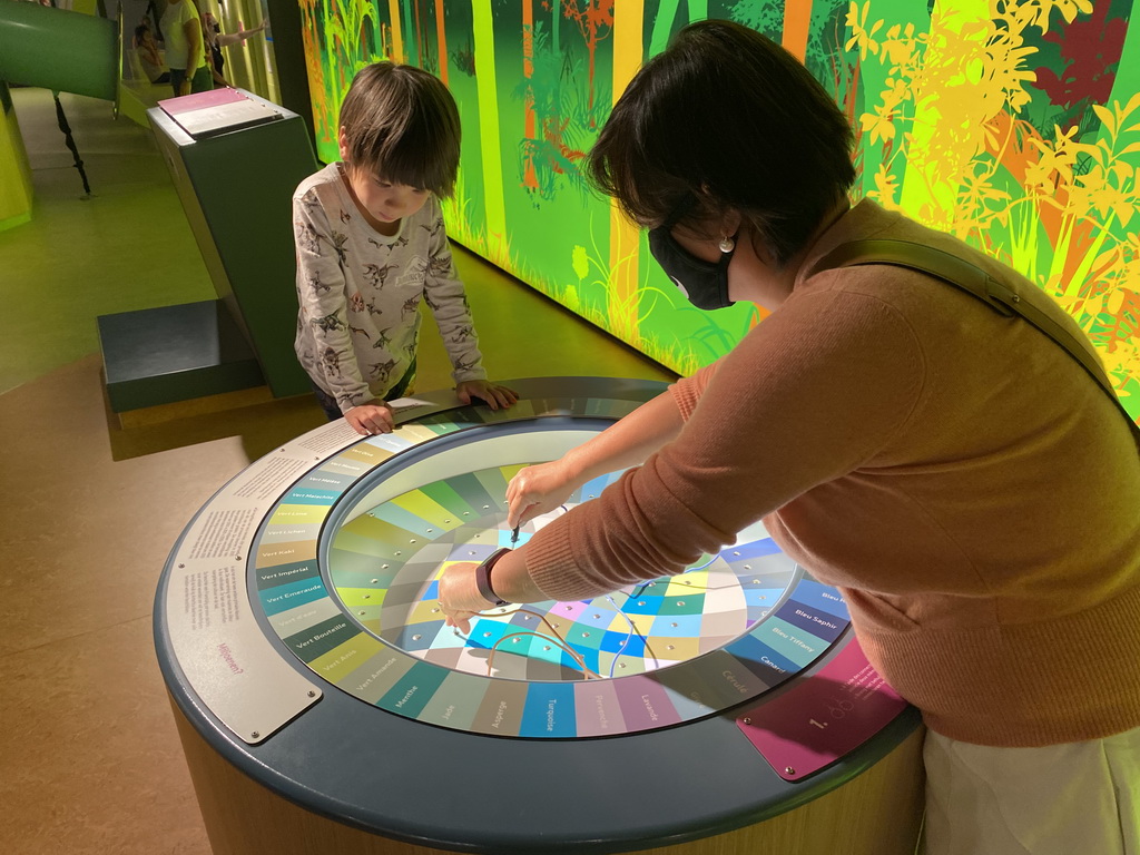 Miaomiao and Max playing a colour game at the sensory room of the Houtopia recreation center