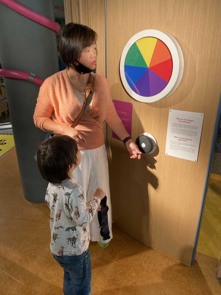 Miaomiao and Max with a Newton disc at the sensory room of the Houtopia recreation center