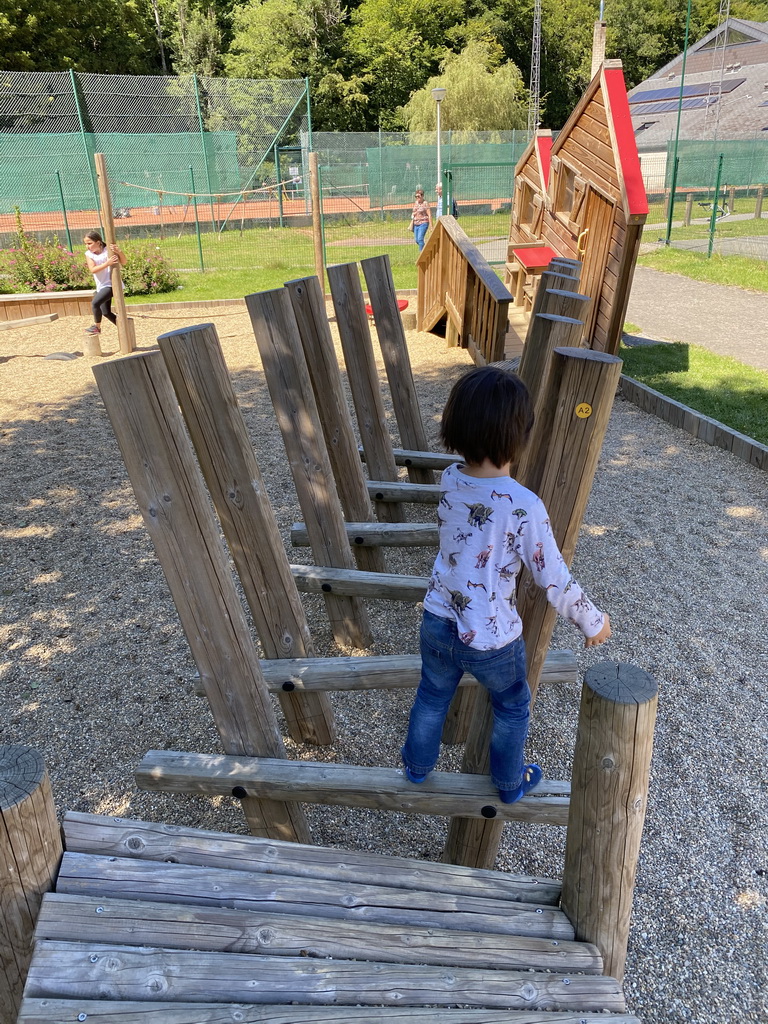 Max on a walkway at the playground of the Houtopia recreation center