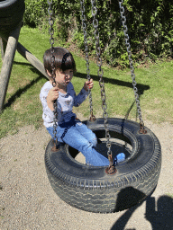 Max on a swing at the playground of the Houtopia recreation center