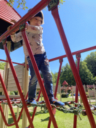 Max on a rope bridge at the playground of the Houtopia recreation center