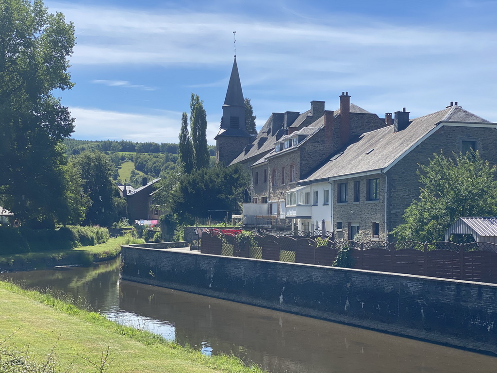 The Eastern Ourthe river and the Église Sainte-Catherine church, viewed from the minigolf court at the northeast side of the town