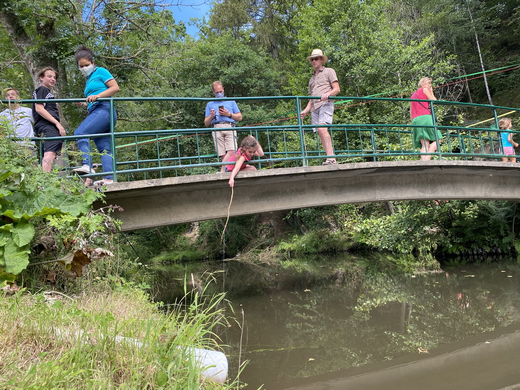 People catching crayfish in the Eastern Ourthe river at the back side of the Vayamundo Houffalize hotel