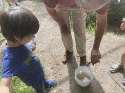 Max and guide with our crayfish at the back side of the Vayamundo Houffalize hotel