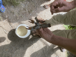 Guide with our crayfish at the back side of the Vayamundo Houffalize hotel