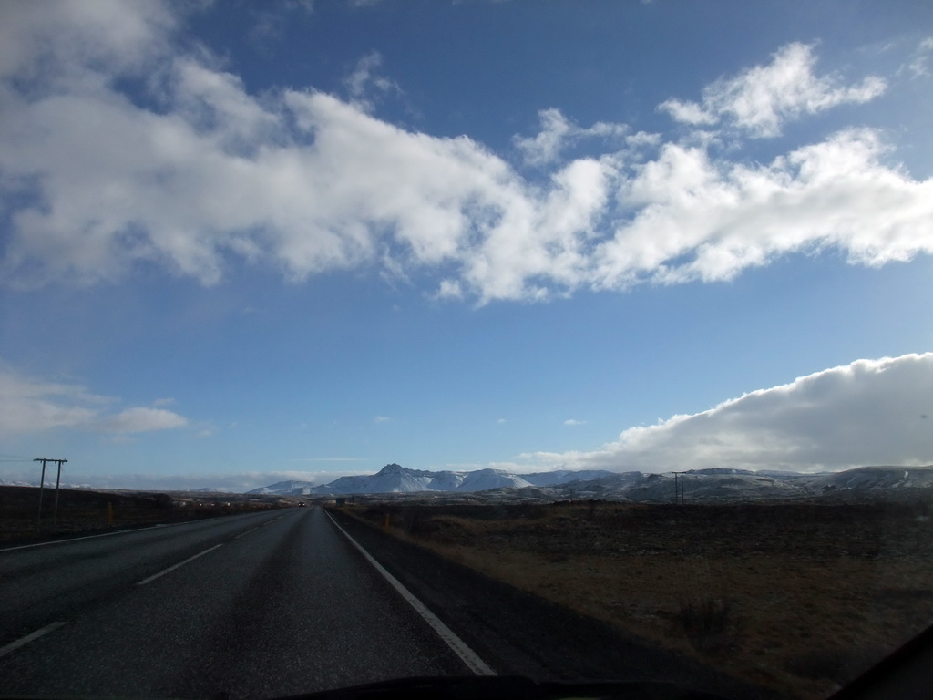 The Suðurlandsvegur road and mountains west of Hveragerthi, viewed from the rental car