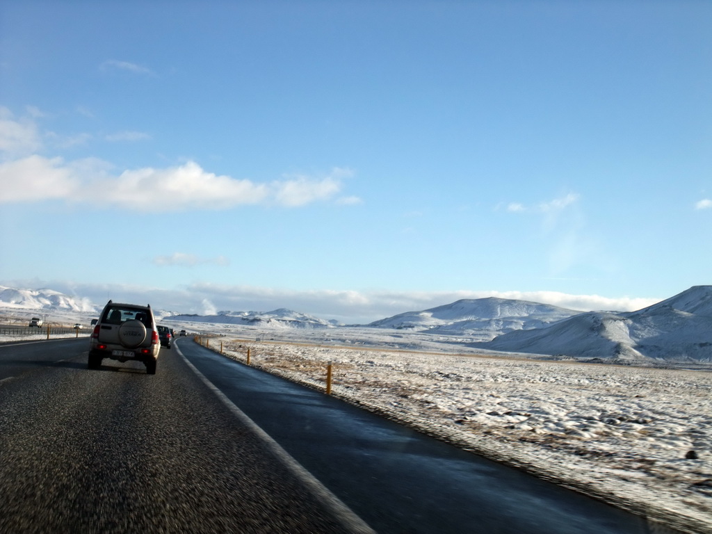 The Suðurlandsvegur road and mountains west of Hveragerthi, viewed from the rental car