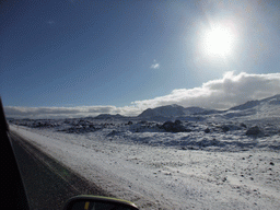 The Suðurlandsvegur road and mountains west of Hveragerthi, viewed from the rental car