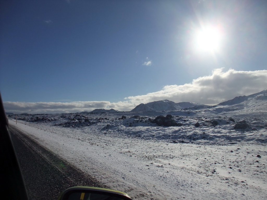 The Suðurlandsvegur road and mountains west of Hveragerthi, viewed from the rental car