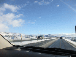 The Suðurlandsvegur road and mountains west of Hveragerthi, viewed from the rental car