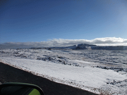 The Suðurlandsvegur road and mountains west of Hveragerthi, viewed from the rental car