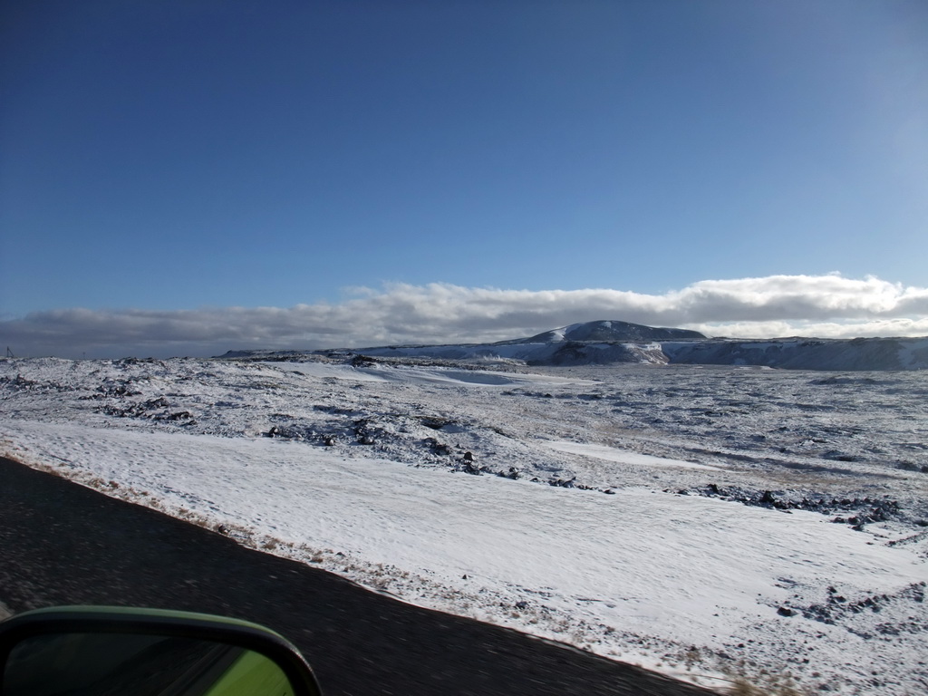 The Suðurlandsvegur road and mountains west of Hveragerthi, viewed from the rental car