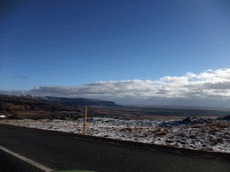 The Suðurlandsvegur road and mountains west of Hveragerthi, viewed from the rental car