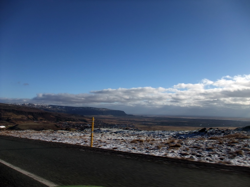 The Suðurlandsvegur road and mountains west of Hveragerthi, viewed from the rental car