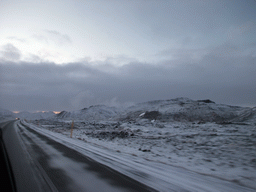 The Suðurlandsvegur road and mountains west of Hveragerthi, viewed from the rental car