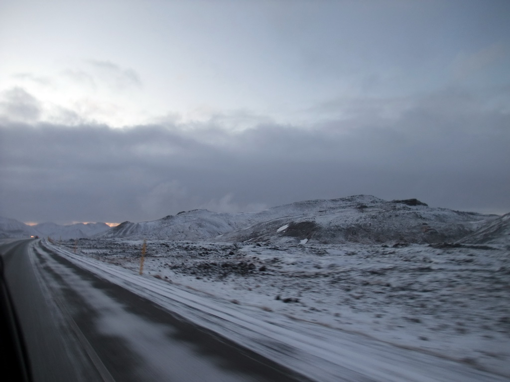 The Suðurlandsvegur road and mountains west of Hveragerthi, viewed from the rental car