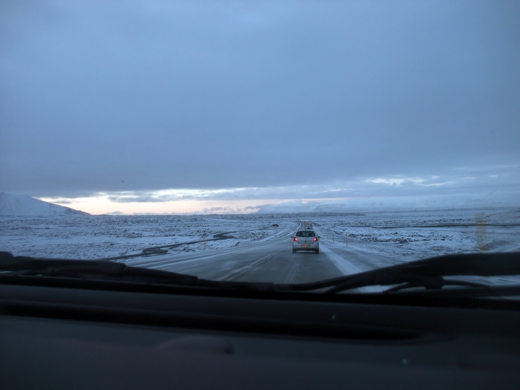 The Suðurlandsvegur road and mountains west of Hveragerthi, viewed from the rental car