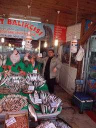 Salesman with fish at the fish market in the Kumkapi neighborhood