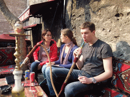 Tim, Ana and Nardy smoking waterpipe in Sogukcesme Sokagi street