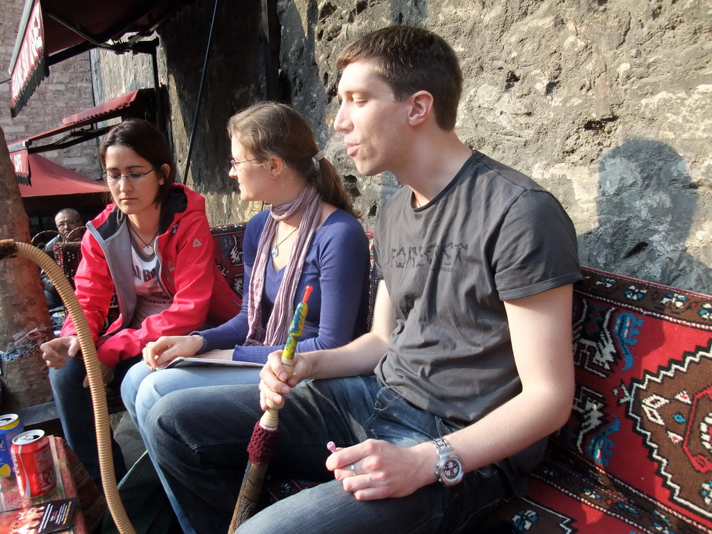 Tim, Ana and Nardy smoking waterpipe in Sogukcesme Sokagi street