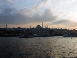 The Rüstem Pasha Mosque, the Süleymaniye Mosque and boats in the Golden Horn bay