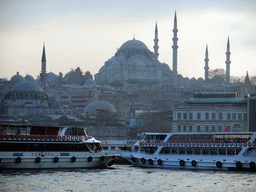 The Rüstem Pasha Mosque, the Süleymaniye Mosque and boats in the Golden Horn bay