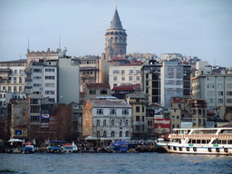 The Beyoglu district with the Galata Tower and boats in the Golden Horn bay