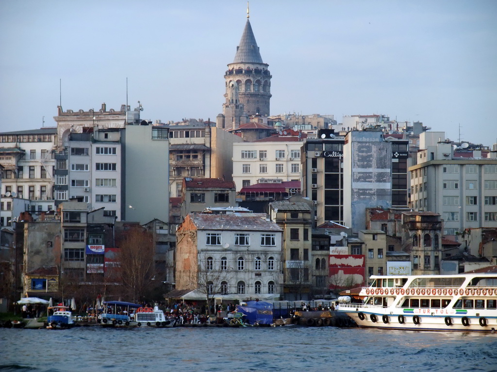 The Beyoglu district with the Galata Tower and boats in the Golden Horn bay