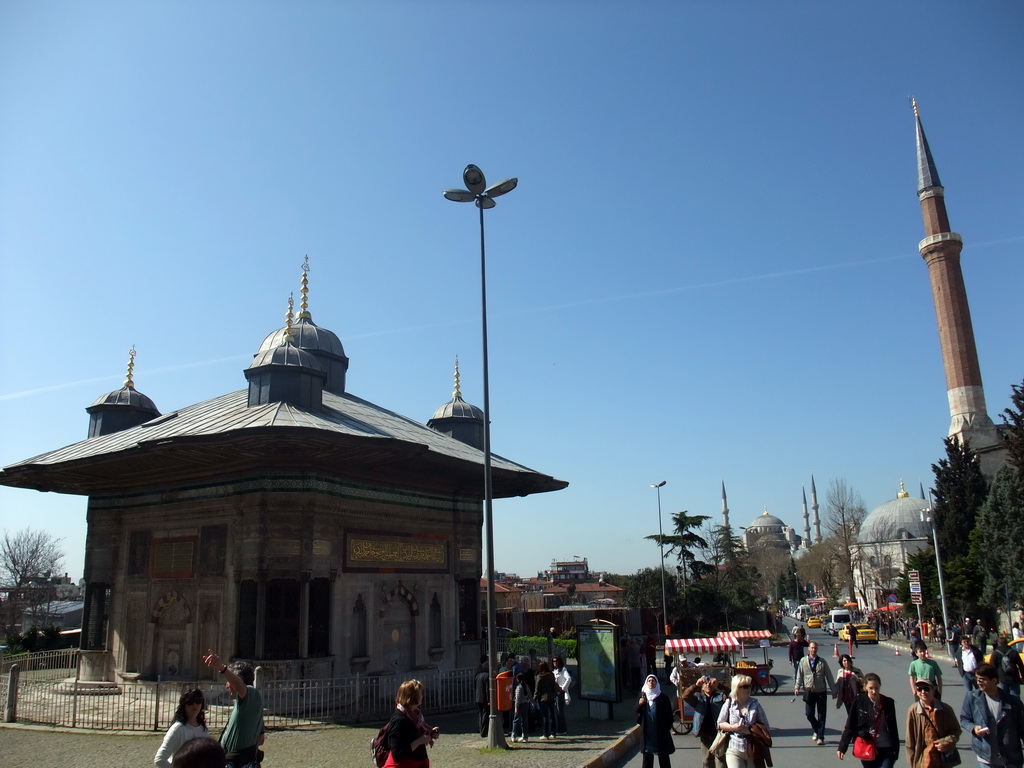 The Fountain of Sultan Ahmed III near the entrance to Topkapi Palace, the Blue Mosque and a minaret of the Hagia Sophia