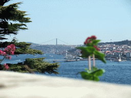 The Uskudar district, the Maiden`s Tower (Kiz Kulesi) and the Bosphorus Bridge (Bogazici Köprüsü) over the Bosphorus strait, viewed from Topkapi Palace