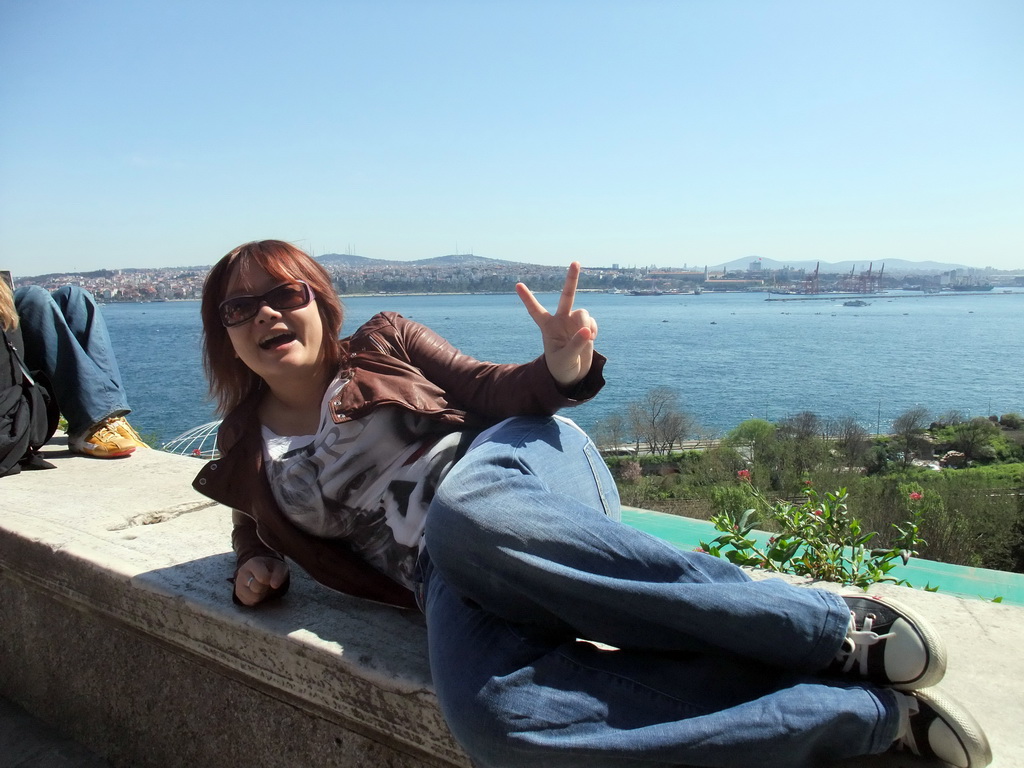 Miaomiao at the Fourth Courtyard of Topkapi Palace, with a view on the Bosphorus strait and the Kadikoy district