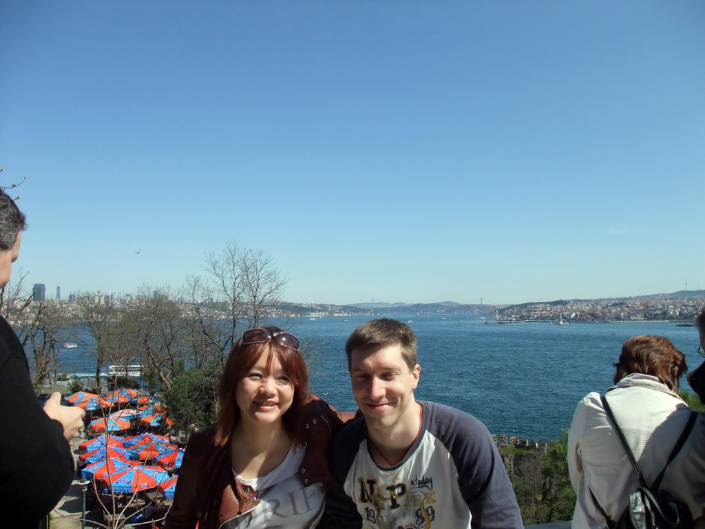 Tim and Miaomiao at the Fourth Courtyard of Topkapi Palace, with a view on the Bosphorus Bridge over the Bosphorus strait, connecting the Besiktas and Uskudar districts