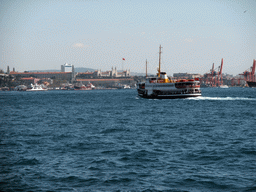 The Kadikoy district with the Selimiye Barracks (Scutari Barracks, Selimiye Kislasi) and the Marmara University Haydarpasa Campus, and the harbour in the Bosphorus strait, viewed from the Bosphorus ferry