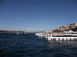 The Bosphorus Bridge and boats in the Bosphorus strait, viewed from the Bosphorus ferry